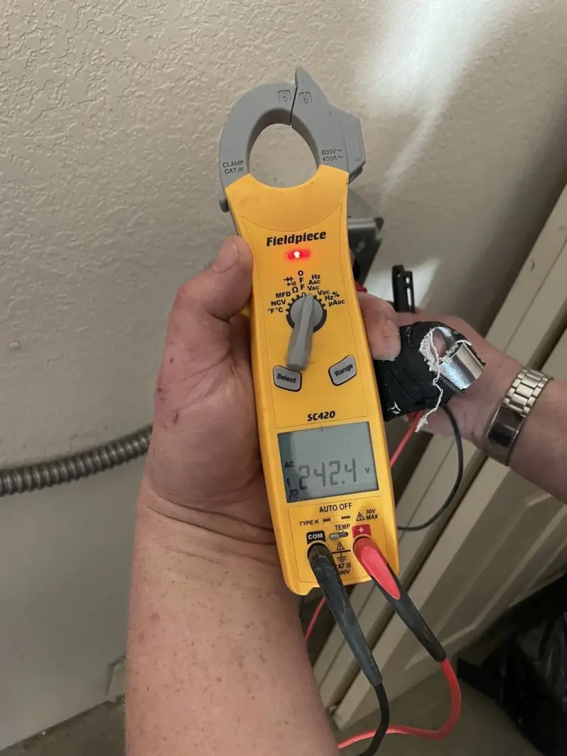 Voltage testing with clamp meter during Generator Installation in Sunrise Manor